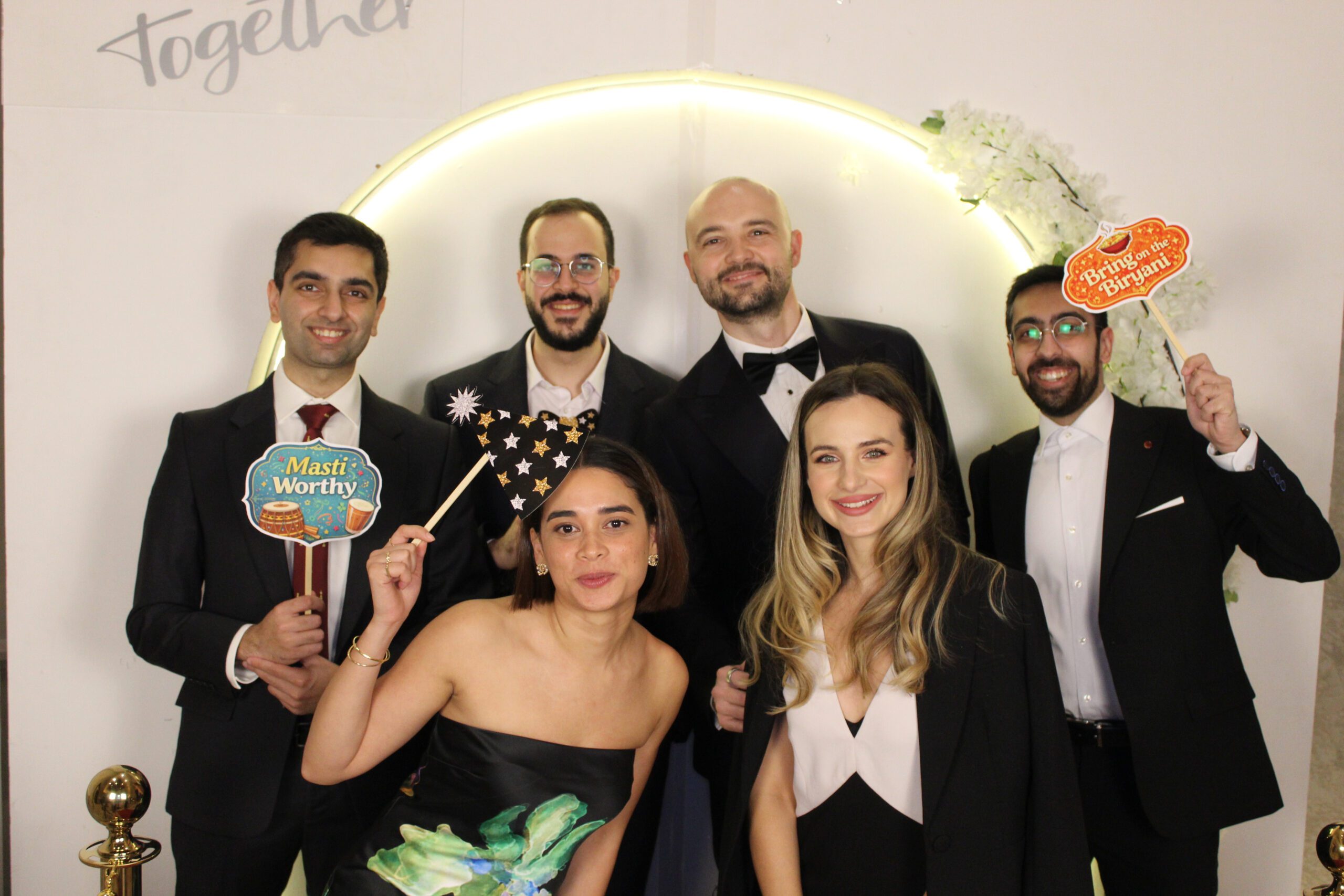Corporate members enjoying the Photo booth rental services